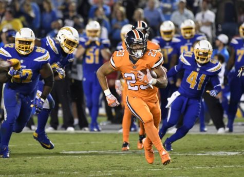 Devontae Booker looks to boost the Broncos run game after a rough few weeks by starter C.J. Anderson. Photo Courtesy of the Denver Post.