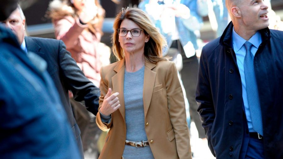Photo Courtesy of channel3000.com 
Lori Loughlin leaving her trial after pleading not guilty.