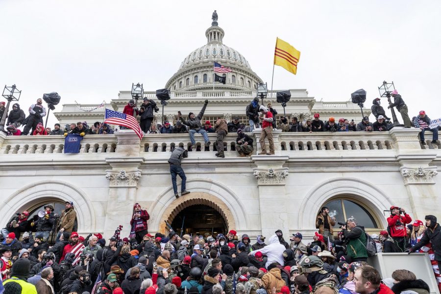 Pro-Trump rioters swarm the Capitol building, incited by the rhetoric of the former President. 
