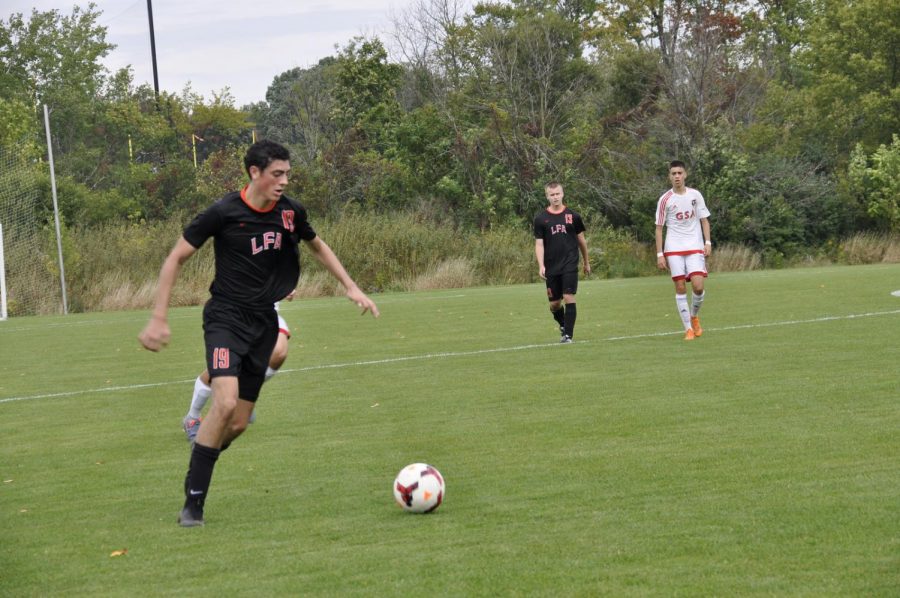 Antonio Ferraiolo 21 plays soccer in a Lake Forest Academy match.