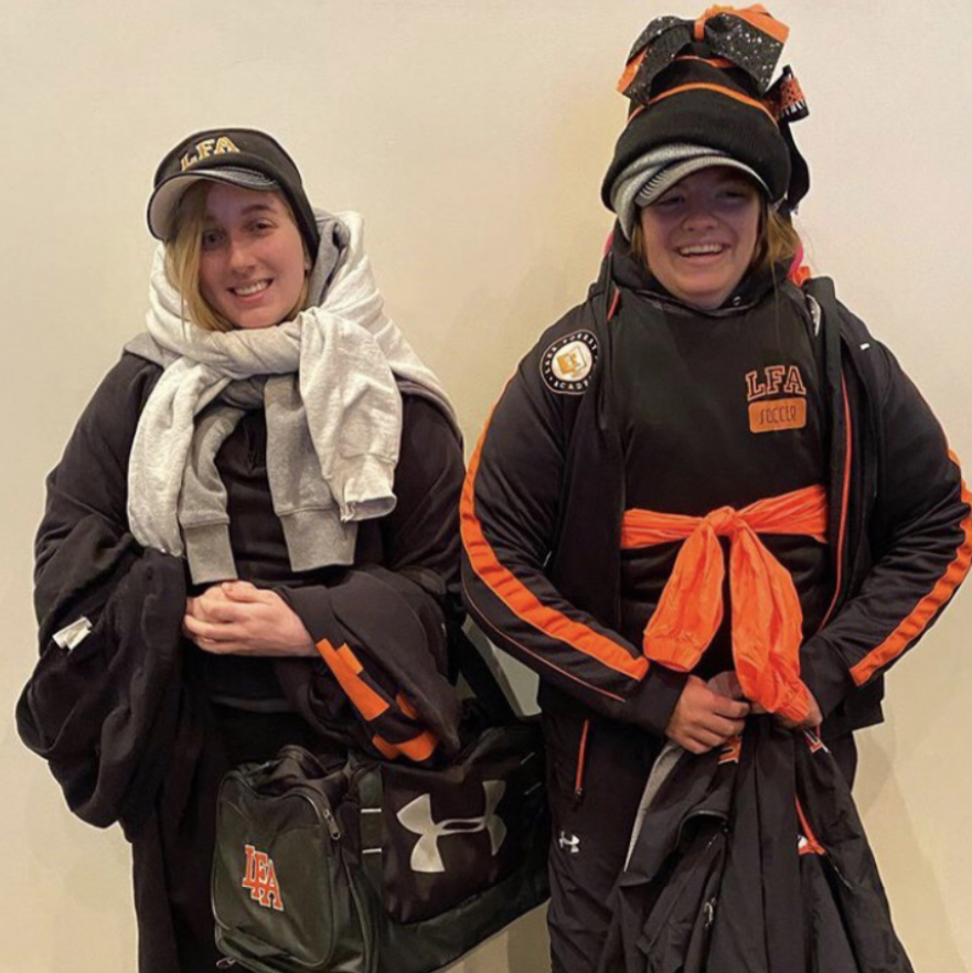 Rachel Johns ‘21 (left) and Abbe Shanley-Roberts ‘21 (right) participate in a House Cup Competition to see who can wear the most layers of LFA-themed clothing.