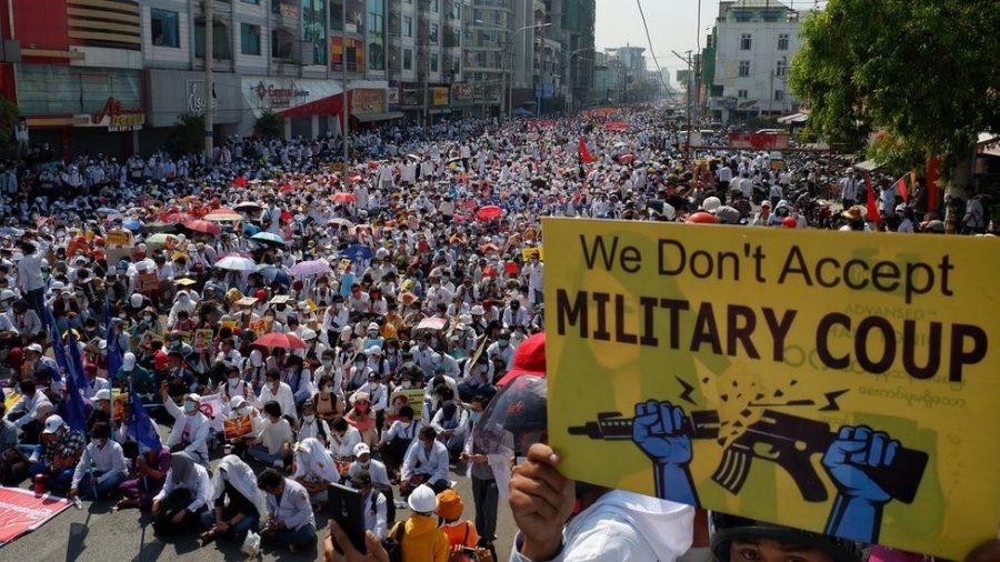 Protestors defy military warning in mass strike.
