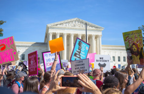 People gather outside the Supreme Court protesting stricter abortion laws in Texas