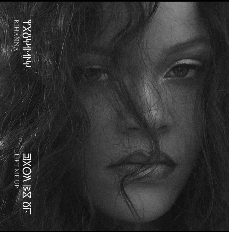 Rihanna poses in new “Lift Me Up” cover art.