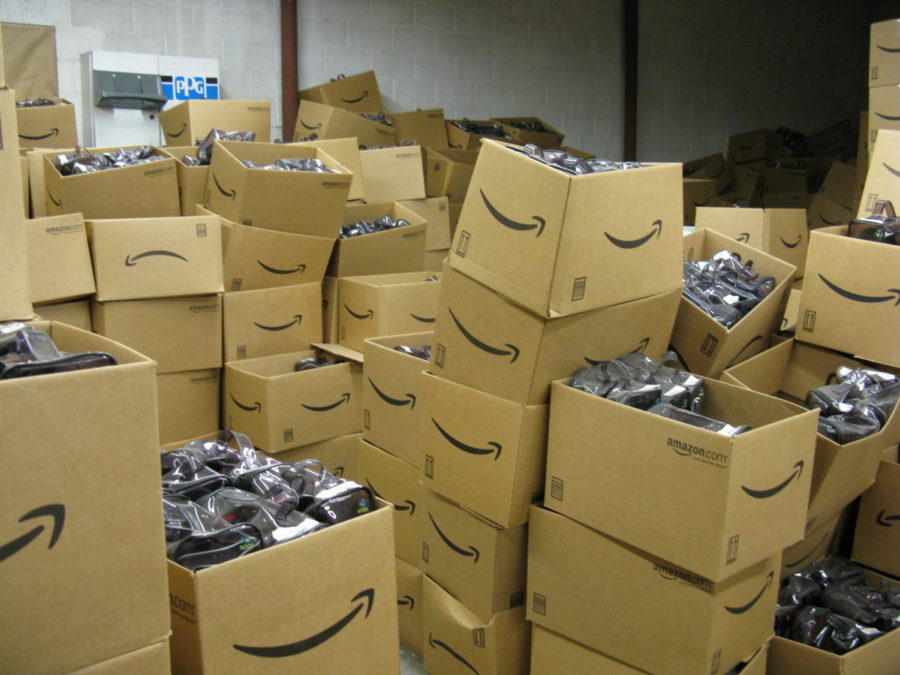 Amazon packages overflow a storage room. 