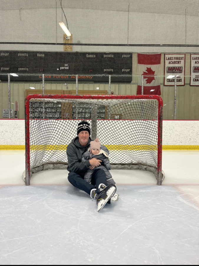 Darrin Madeley with his grandaughter on the LFA ice hockey rink.