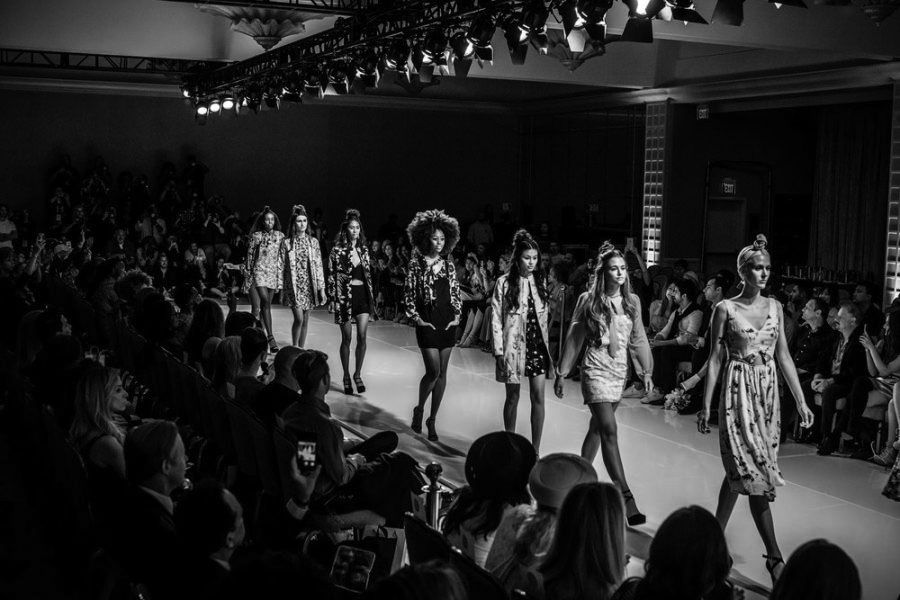 Models walking on the runway of 2023 Fashion Week show. 
