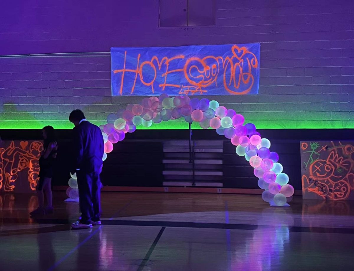 Glow+in+the+dark+decorations+adorn+Homecoming+to+match+the+theme.