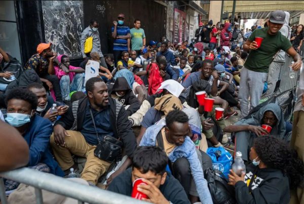 Migrants out on the streets because they dont have places to stay in