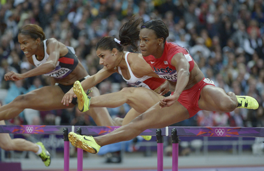 Kellie Wells competes in the womens 100m hurdles semifinals during the 2012 London Olympic Games.