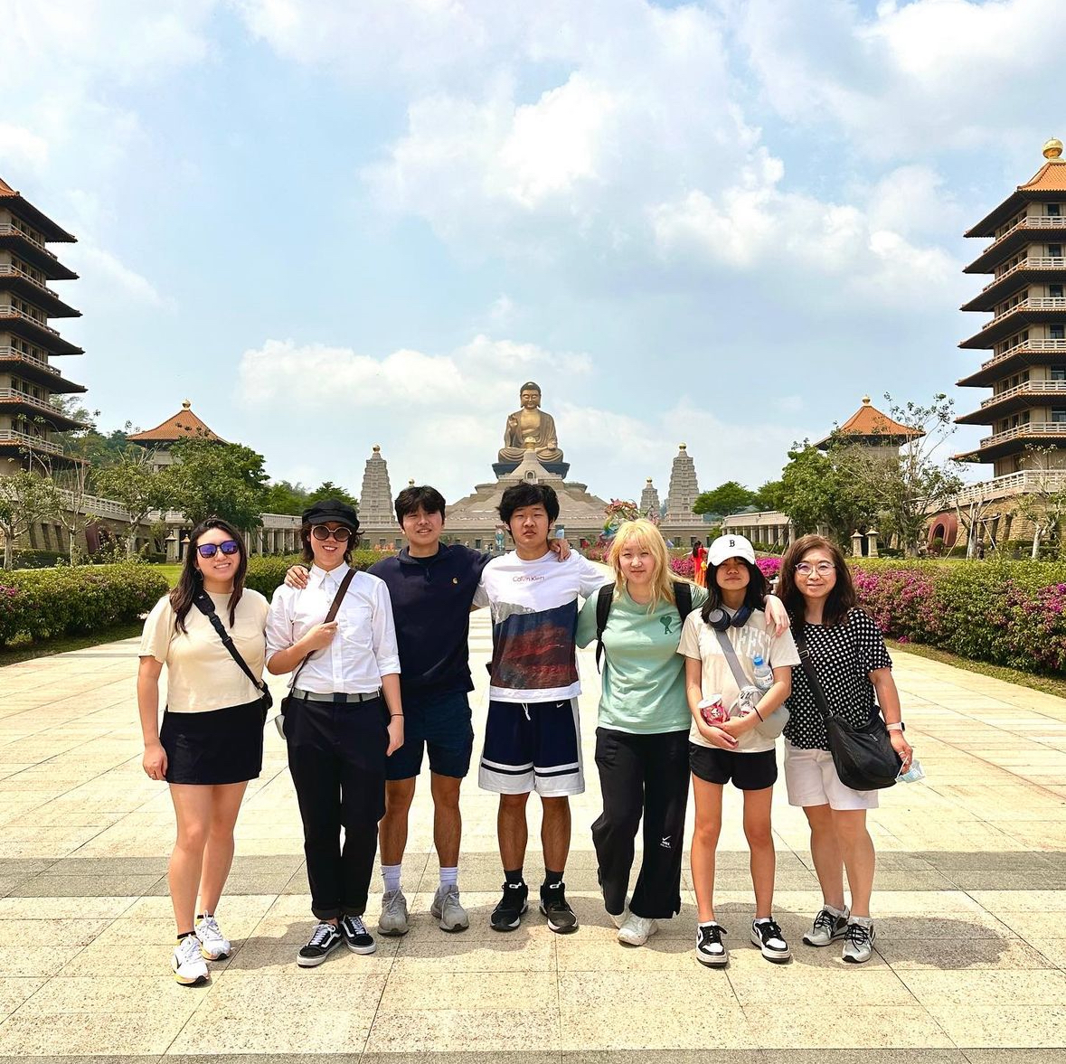 AP  and Post-AP Chinese students stand in front of a monument in Taiwan.